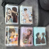 A set of three mini transparent photo albums featuring K-pop idols, displayed on a gray fabric background.