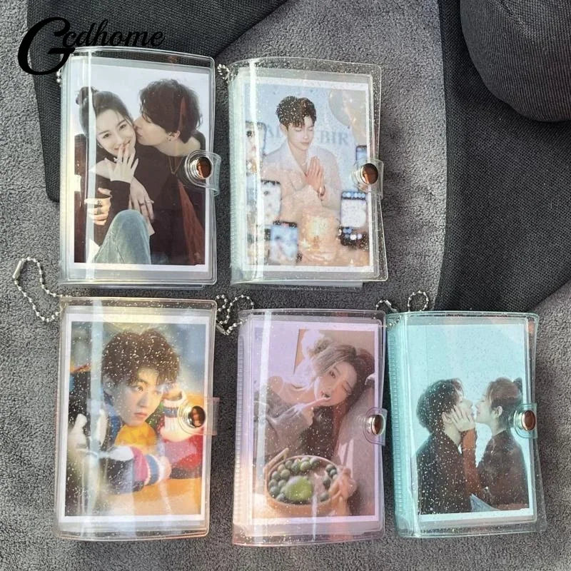 A set of three mini transparent photo albums featuring K-pop idols, displayed on a gray fabric background.