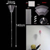 A long, silver balloon arch kit with a stand, showing components and an assembled arch in a white room.