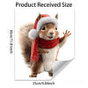 A realistic plush squirrel wearing a red scarf and hat, used as a Christmas window decoration.