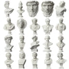 A collection of plaster bust miniatures depicting various classical figures and heads.