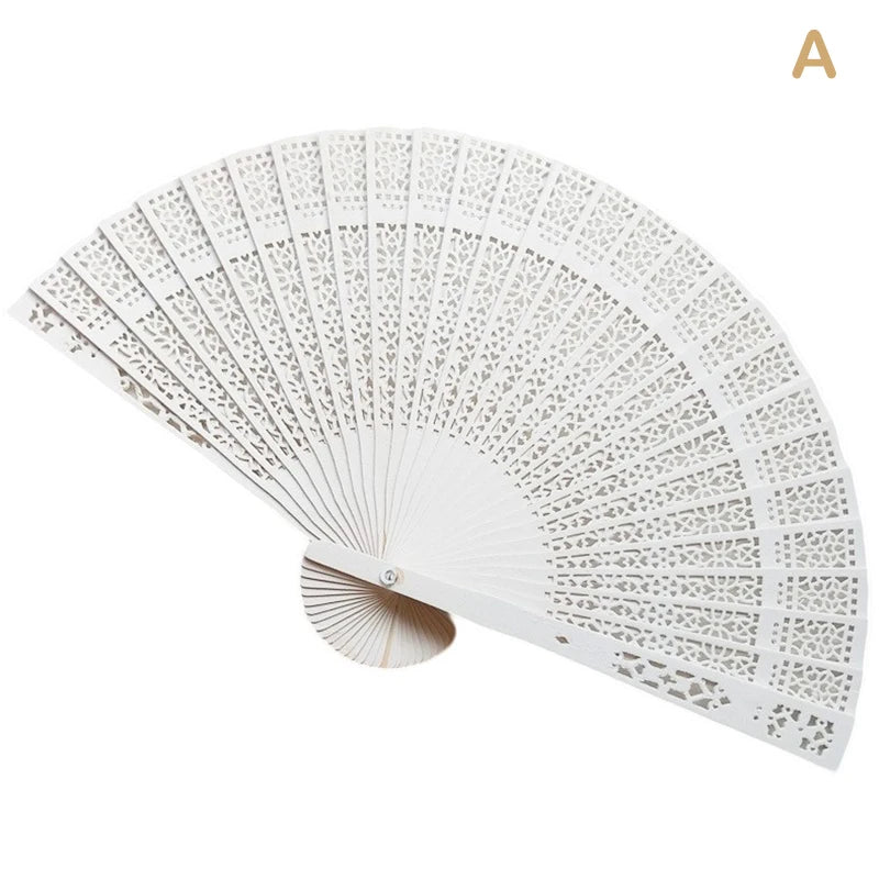 A white hand carved bamboo folding fan shown in a fan shape.