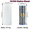 A tall blue pillar candle mold featuring celestial and mystical symbols for making a chakra-themed candle.