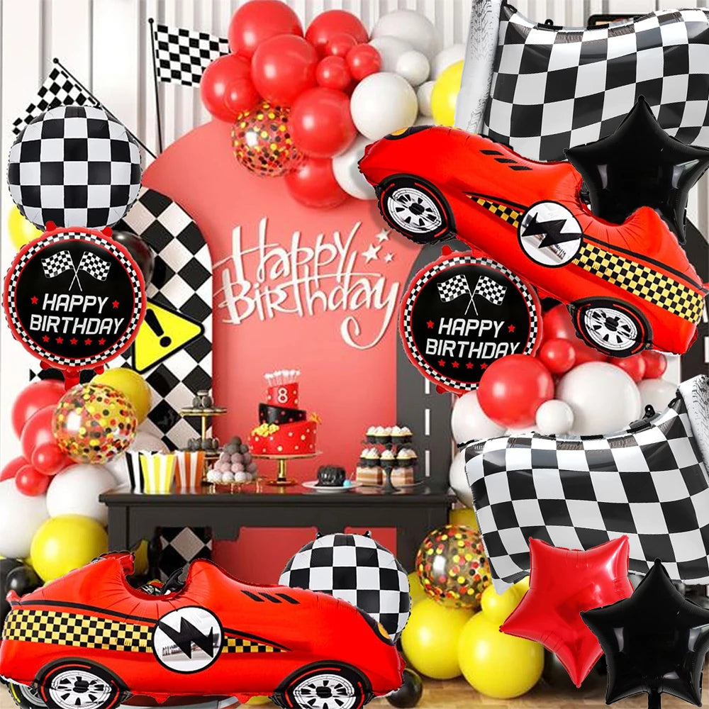 A collection of red and yellow race cars, balloons, and a checkered flag design for a birthday celebration.