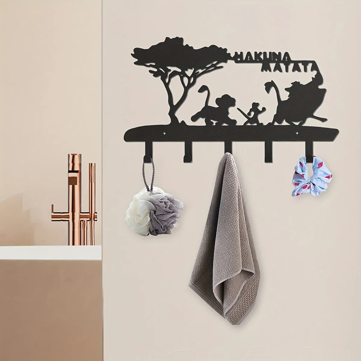 Black silhouette decorative metal key hooks for wall organization featuring a tree and a monkey