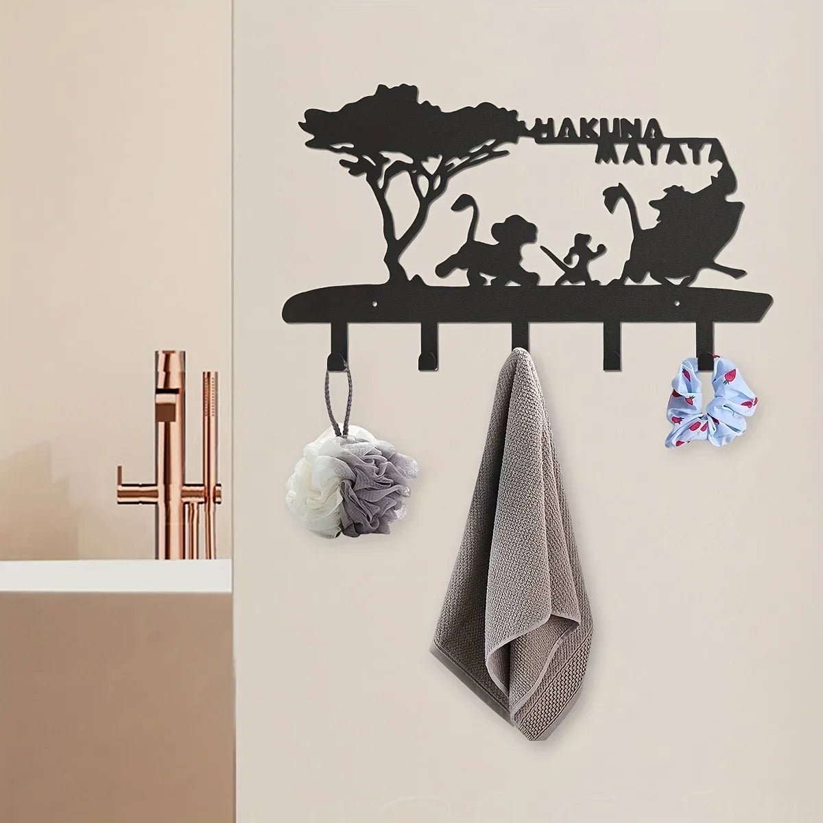 Black silhouette decorative metal key hooks for wall organization featuring a tree and a monkey