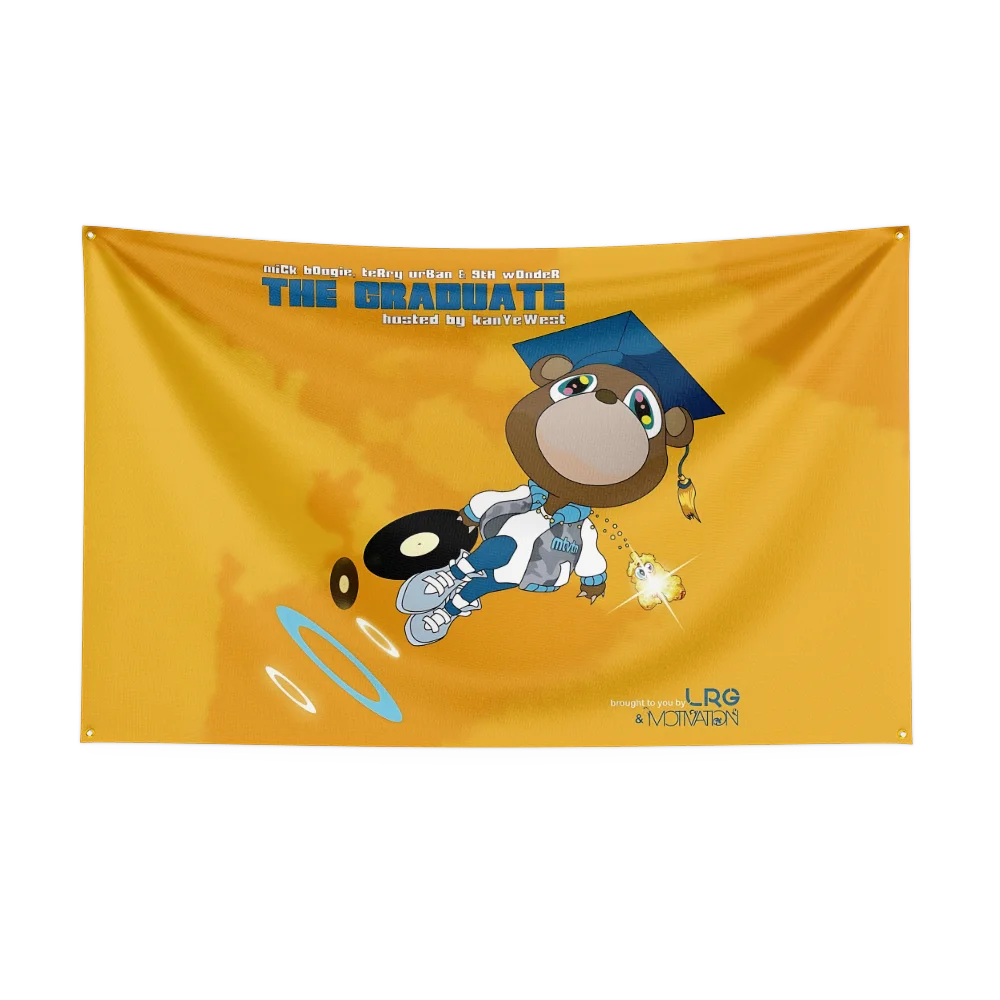 A yellow flag tapestry featuring a cartoon monkey graduate wearing a blue cap and gown, with text acknowledging Kanye West.