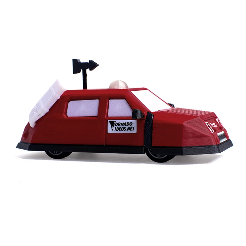 A red armored vehicle model replica featuring a chaser arm mounted on the roof.