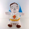 A plush doll depicting Jesus and the Virgin Mary with soft features and blue and white clothing.