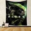 A dark tapestry wall hanging featuring a menacing alien creature against a green glow.