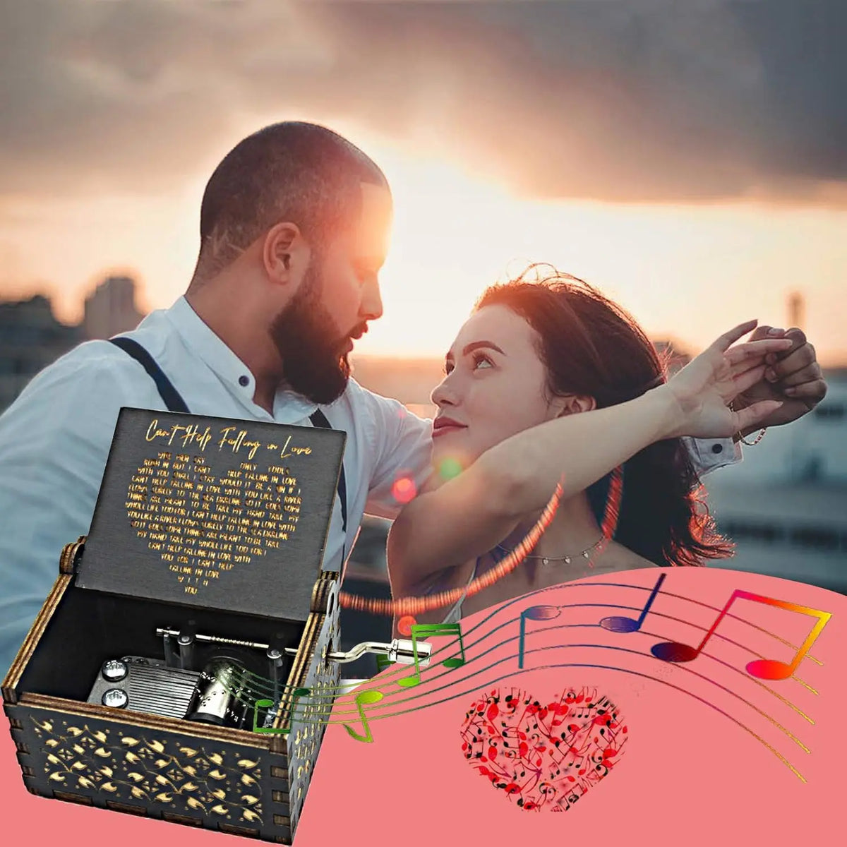 A woman and man embracing against a sunset background with a music box in the foreground.