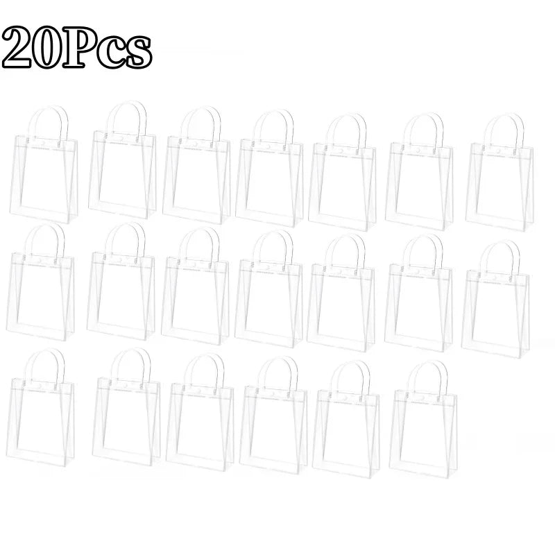 A set of twenty clear reusable PVC gift bags with handles displayed in a line.