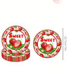 A set of 10 pink and red strawberry-themed disposable plates for a birthday party.