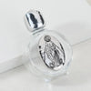Decorative glass bottle with a silver figurine inside and a twist cap