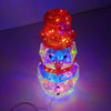 A colorful prismatic LED snowman decoration with glowing lights on a wire.