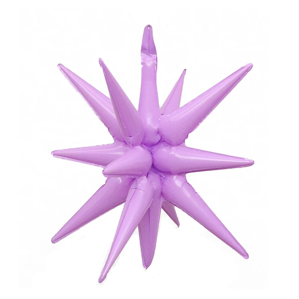 A cluster of purple star burst foil balloons for party decor