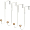 A set of four white heavy duty over-the-door hooks with curved hangers.