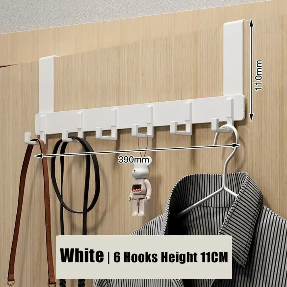 White heavy duty aluminum door hooks with 6 capacity mounted on a wooden wall.