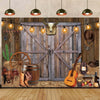 A rustic western backdrop featuring a wooden barn door, leather tack, a guitar, and various cowboy elements.