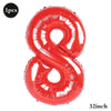 A shiny red foil balloon shaped like the number 8, indicating a 32-inch size.