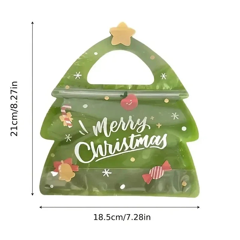 A clear green reusable Christmas gift bag with a star topper and festive text