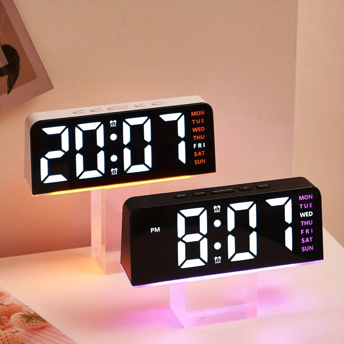 A black LED digital alarm clock with an ambient glow displays the time 20:07 and the day of the week.
