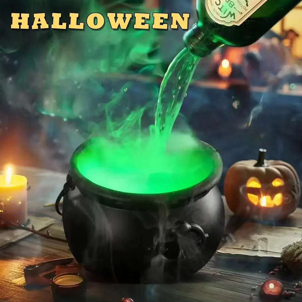 A black witch cauldron is pouring a green liquid into the air, creating fog and mist in a dark Halloween setting.