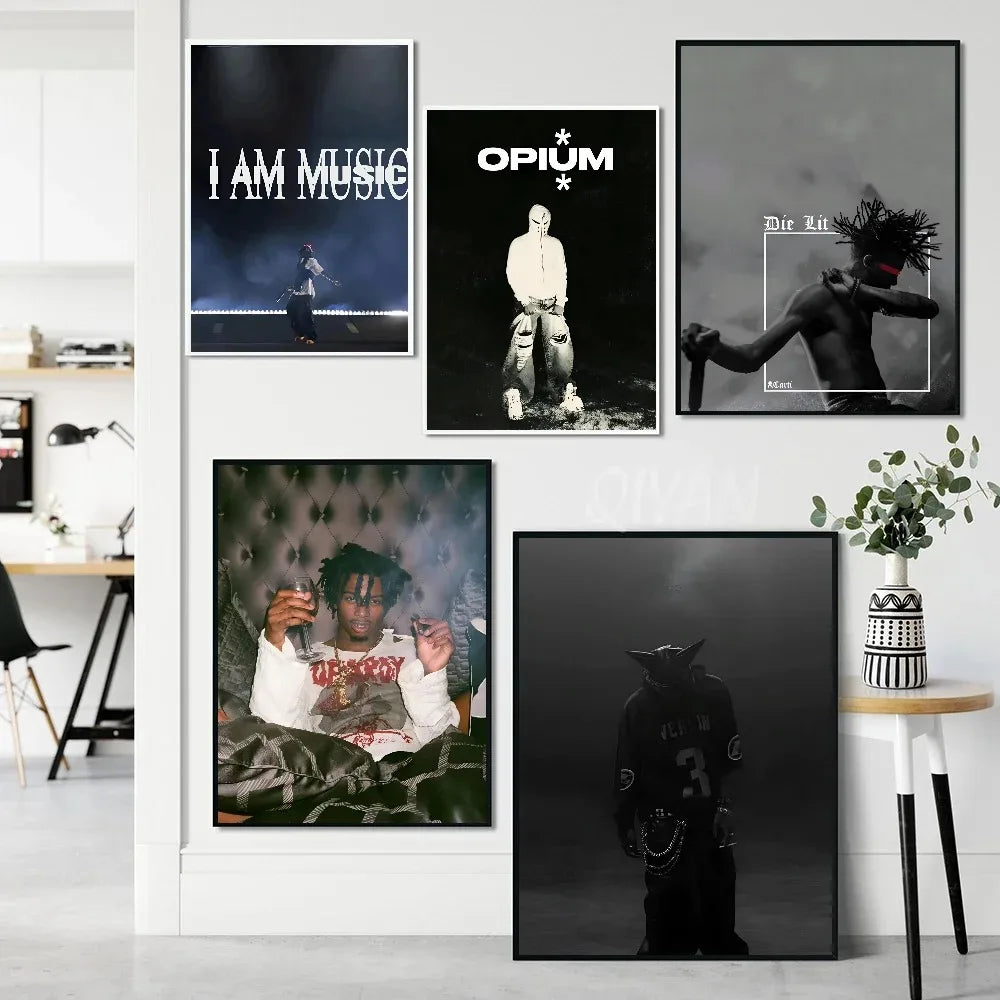 A gallery wall featuring three pieces of black and white artwork related to Playboi Carti's Opium era.