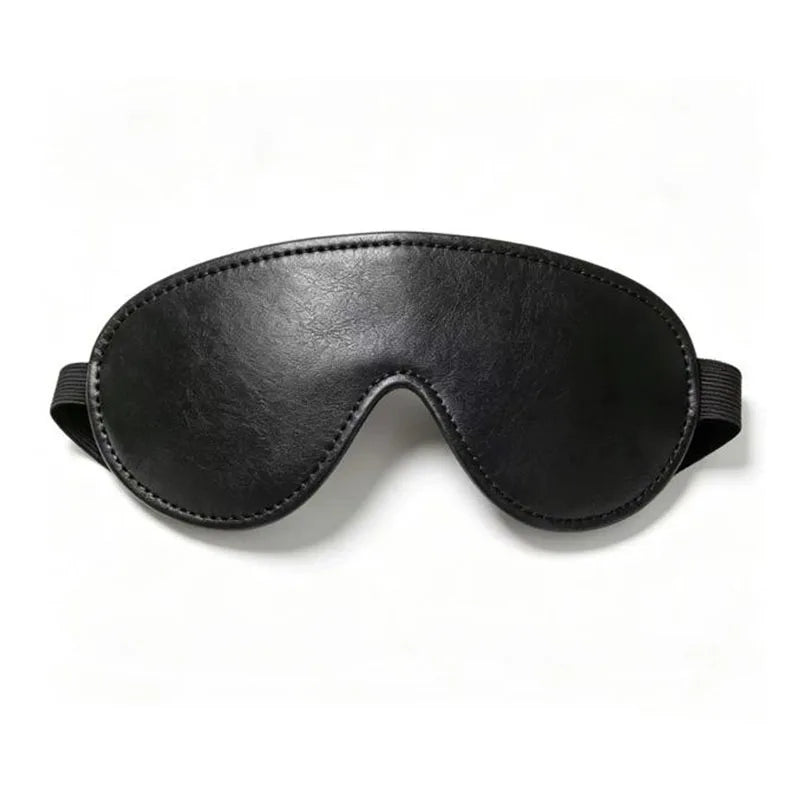 Black adjustable PU leather cat eye masquerade mask shown from the front.
