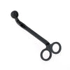 Black stainless steel candle wick trimmer scissors shown against a white background.