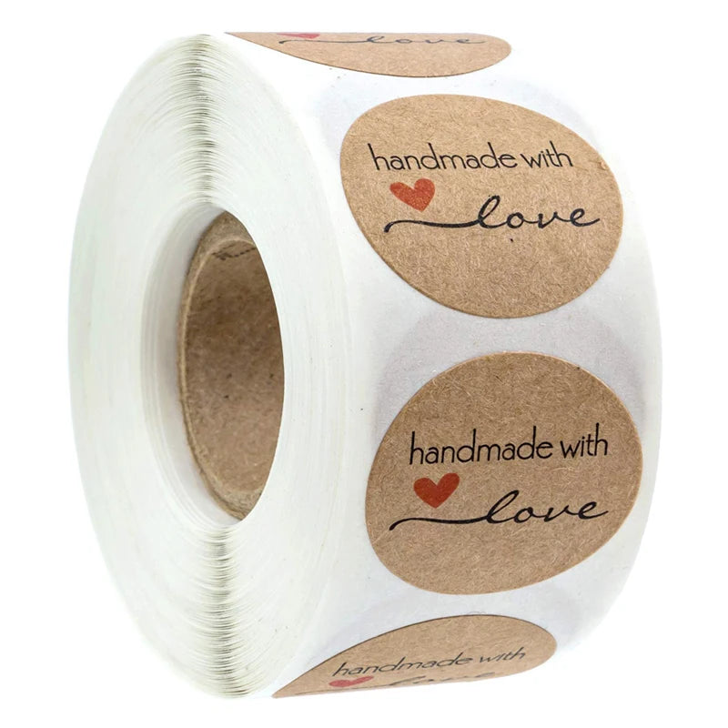 Roll of kraft paper thank you stickers with handmade with love text on round labels