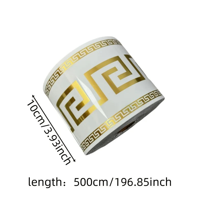 Roll of self-adhesive PVC baseboard trim featuring a gold and white brick pattern