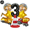 Eight construction truck foil balloons and a traffic cone for birthday party decor