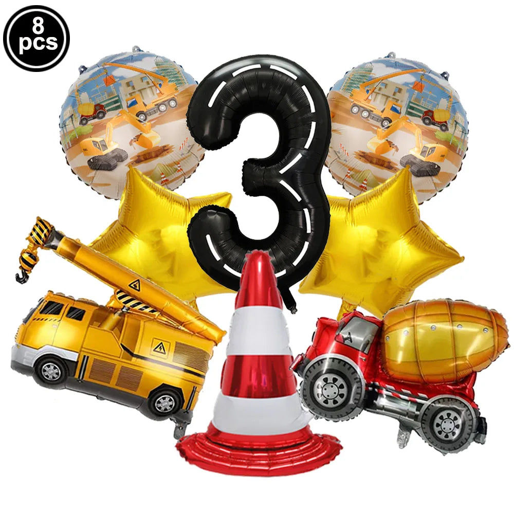 Eight construction truck foil balloons and a traffic cone for birthday party decor