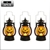 Three black pumpkin lanterns with LED projection effects for Halloween decoration