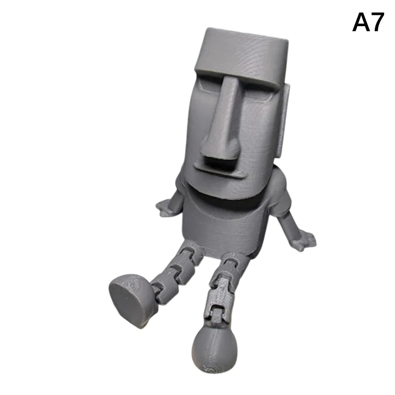 A gray 3D printed Moai statue figurine with movable joints.