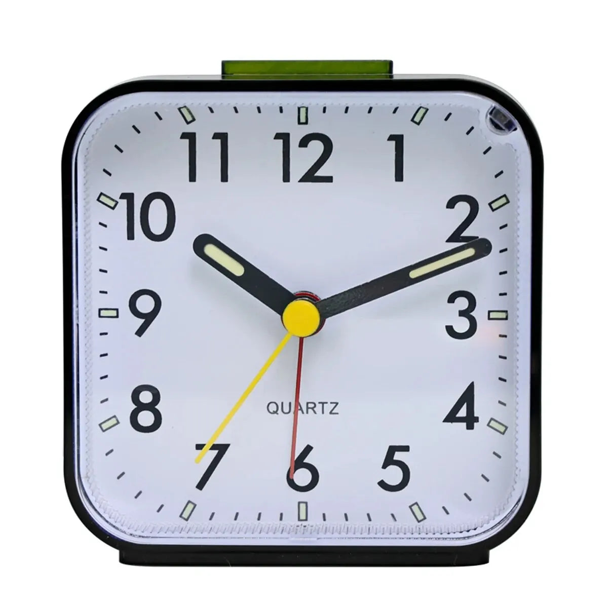 A white analog alarm clock face with black markings and yellow hands displaying the time.