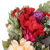 Artificial hydrangea wreath featuring red, pink, and purple flowers and green foliage