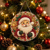 A Christmas pearl diamond painting suncatcher kit with a Santa face hanging on a tree.