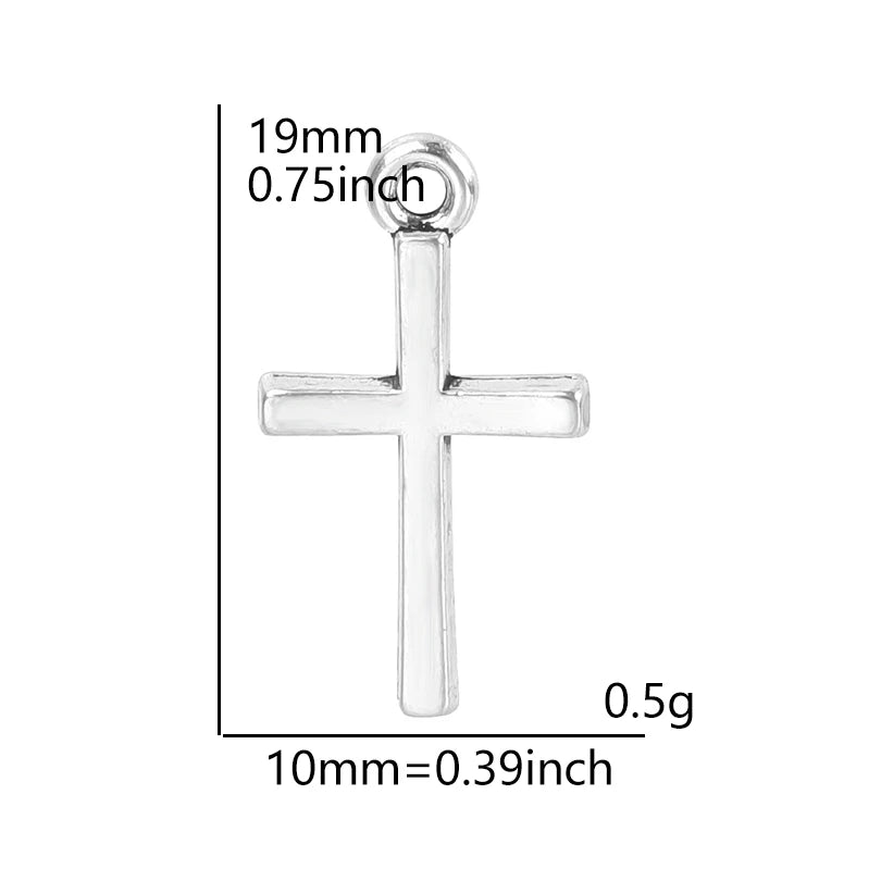 Silver cross charm measuring 19mm long and weighing 0.5g