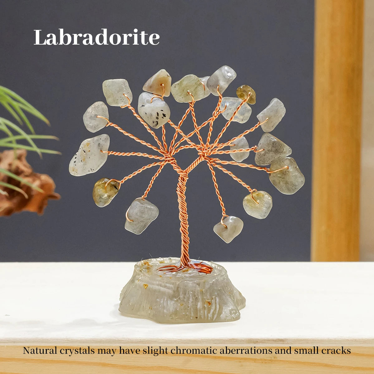 A Labradorite crystal tree featuring natural, translucent gray and yellowish stones branching out from a base.
