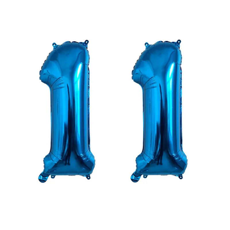 A shiny blue foil number balloon shaped like the number 1, used for birthday party decor.