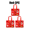 Red 3-piece set of Merry Christmas gift bags with handles featuring festive holiday designs