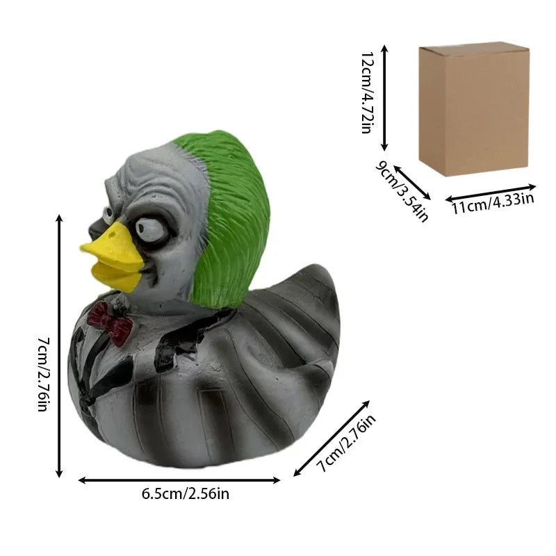 A gray and green resin figurine of a duck with a yellow beak and spooky features.