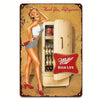 A vintage beer metal tin sign featuring a woman posing next to a refrigerator with the text Thank You, Refrigerator and Mille