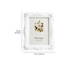 White rose relief photo frame with a decorative white border and a floral arrangement inside