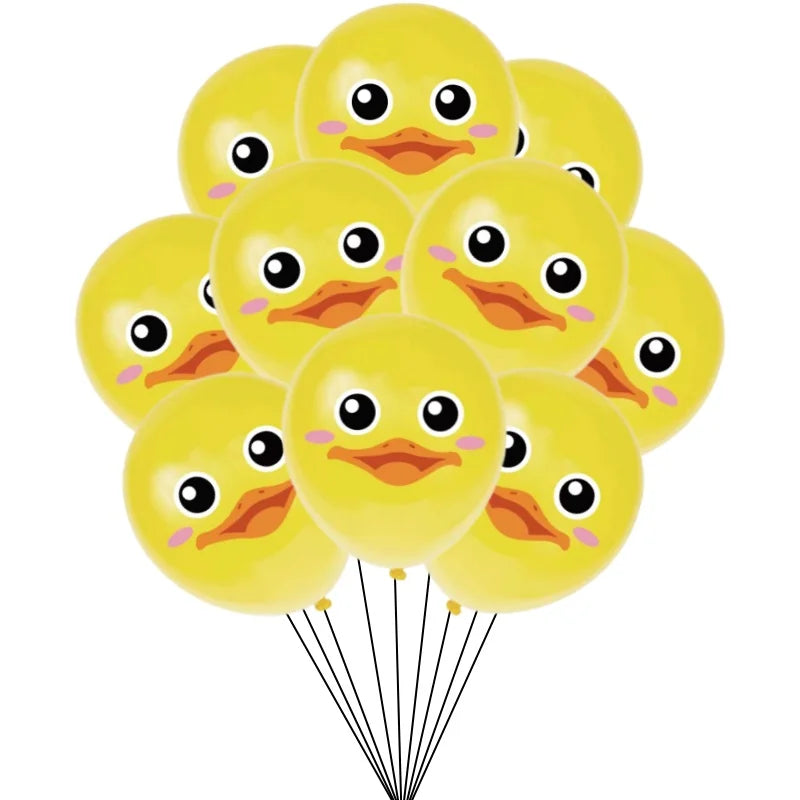 A bunch of yellow farm animal latex balloons with cute faces