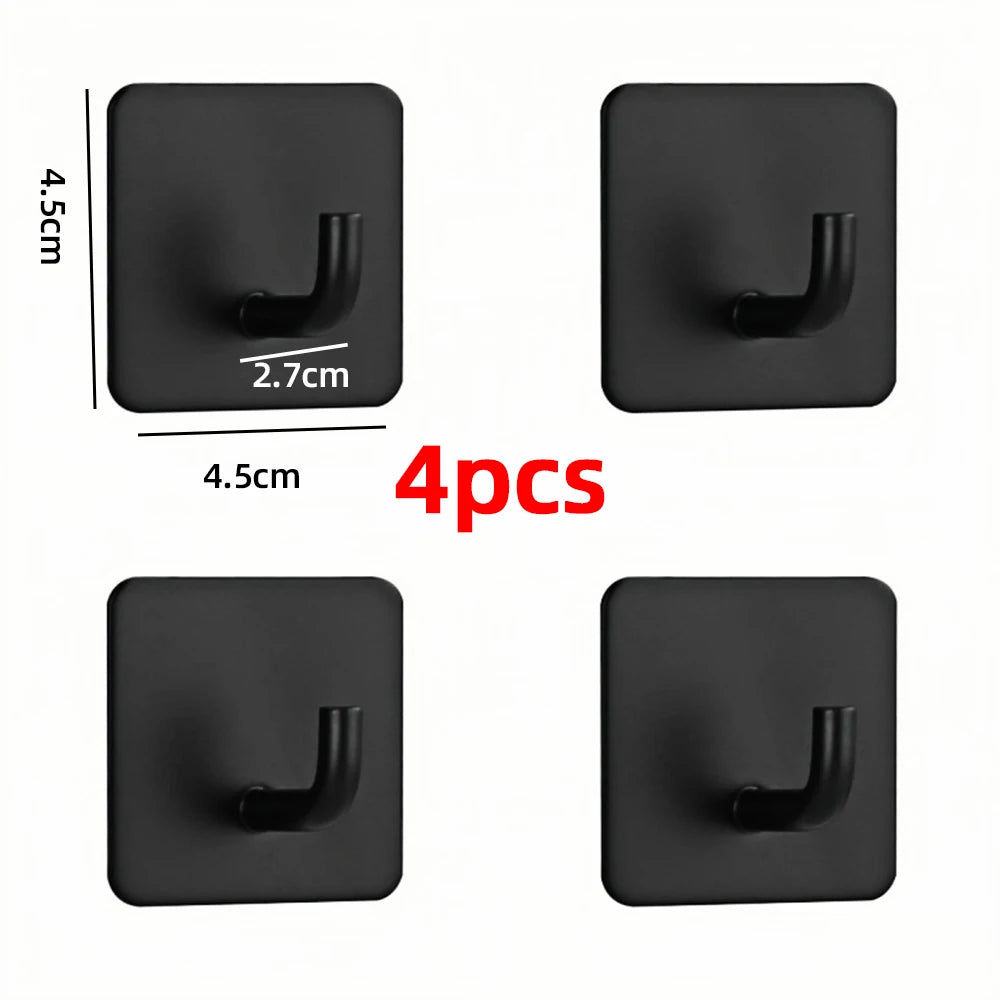 Four black stainless steel self-adhesive wall hooks with a curved hook shape shown in various views.