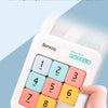 A hand holds a white magnetic sliding block puzzle with numbered pieces, demonstrating strong adhesion.