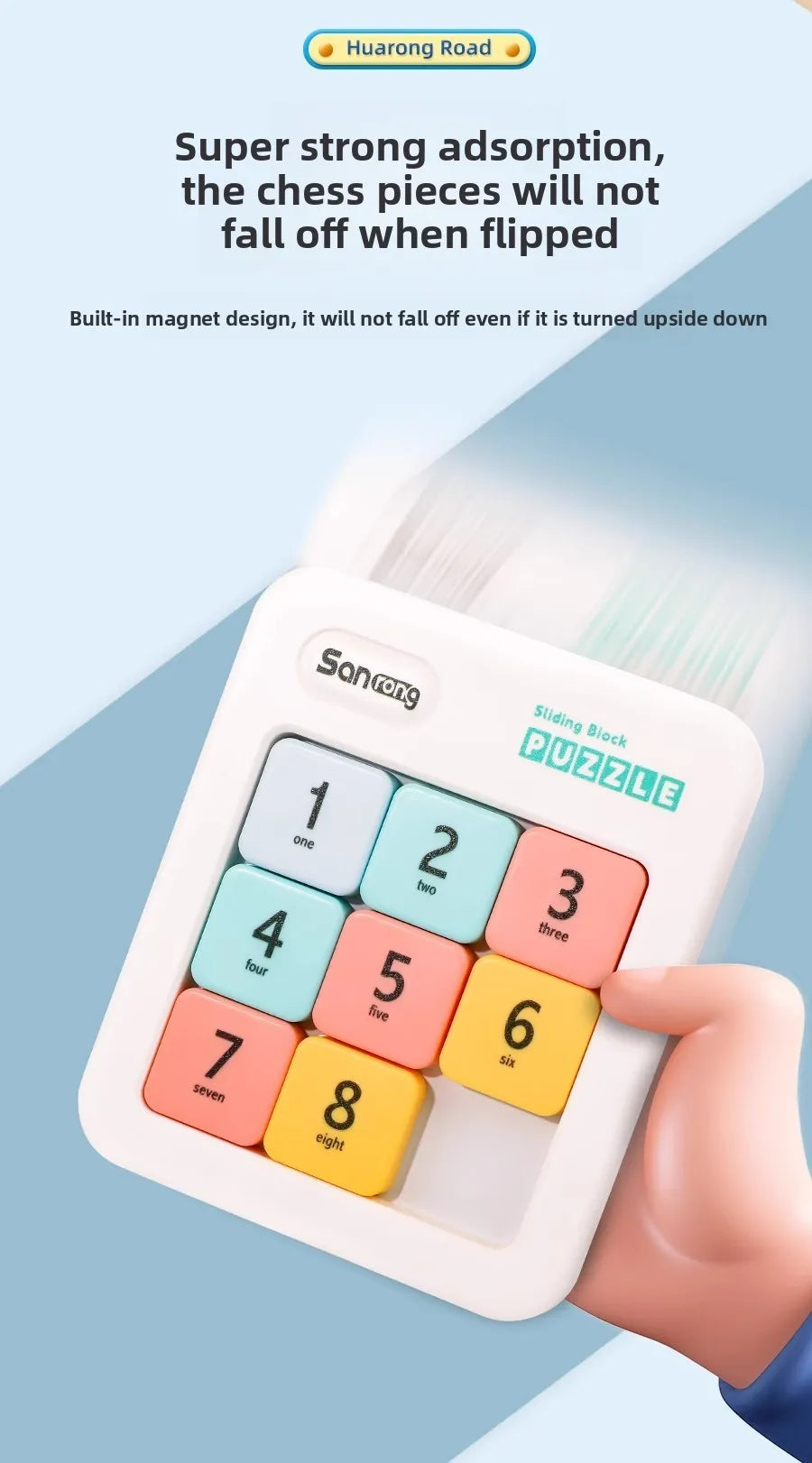 A hand holds a white magnetic sliding block puzzle with numbered pieces, demonstrating strong adhesion.